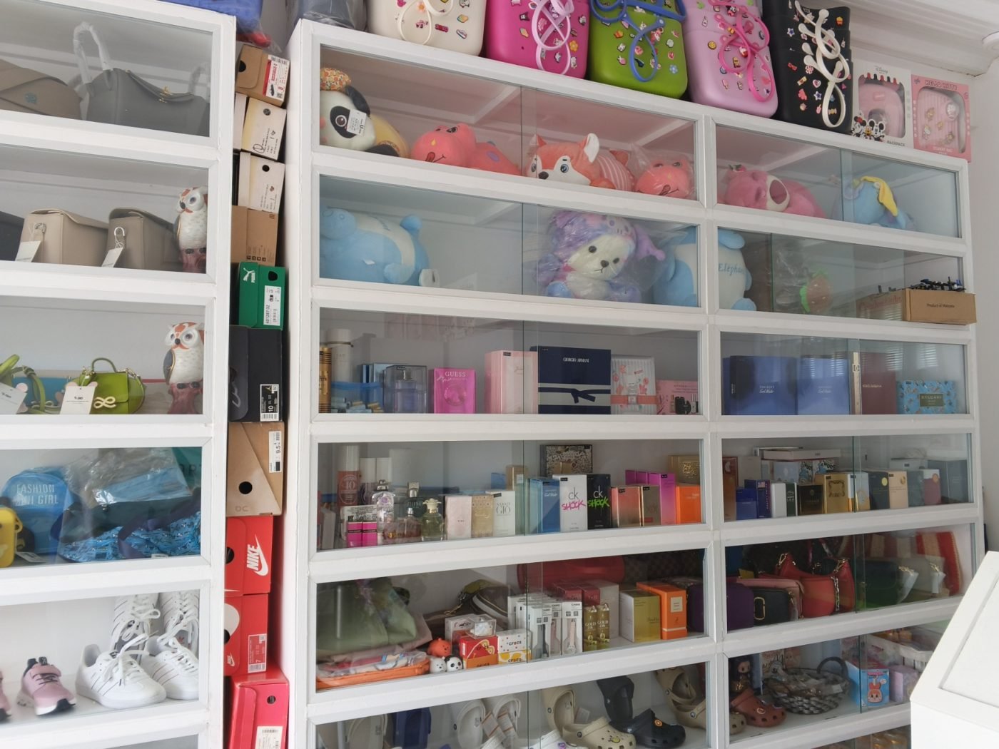 Imported bags, sneakers, and perfume on display at AGAFE